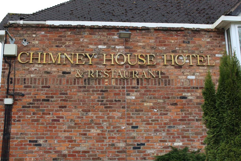 Chimney House Hotel And Restaurant แซนด์แบท ภายนอก รูปภาพ